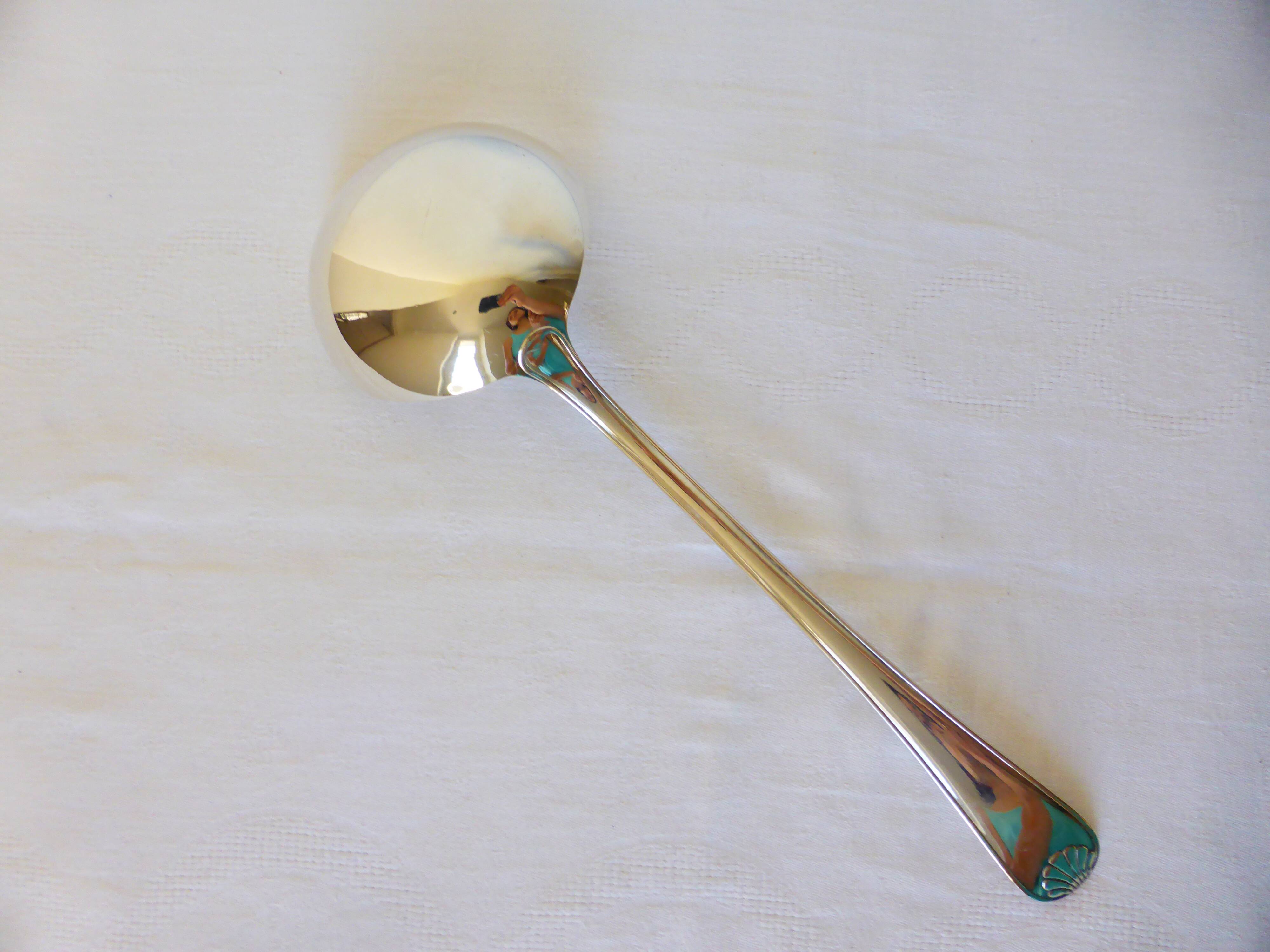1 silver-plated metal ladle stamped 2106248