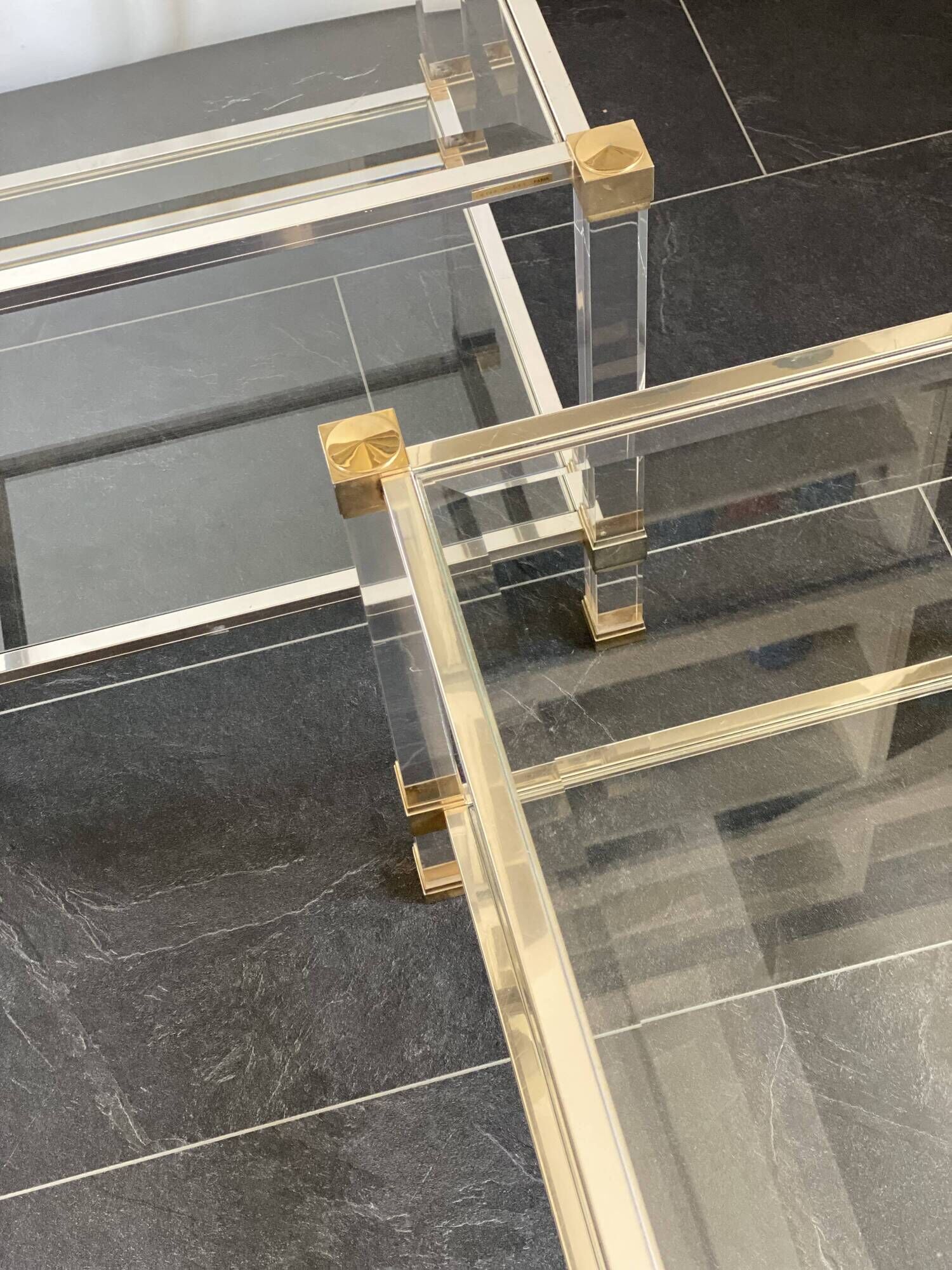 Pair of vintage and brass glass hollywood regency side tables by peter vandel