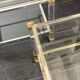 Pair of vintage and brass glass hollywood regency side tables by peter vandel