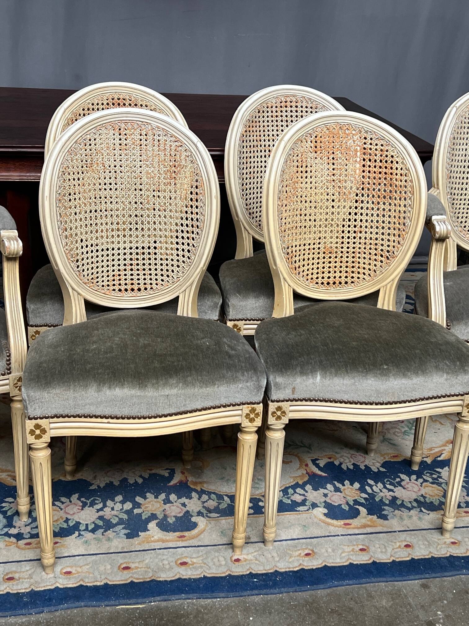 Set of four Louis XVI style chairs and two armchairs.