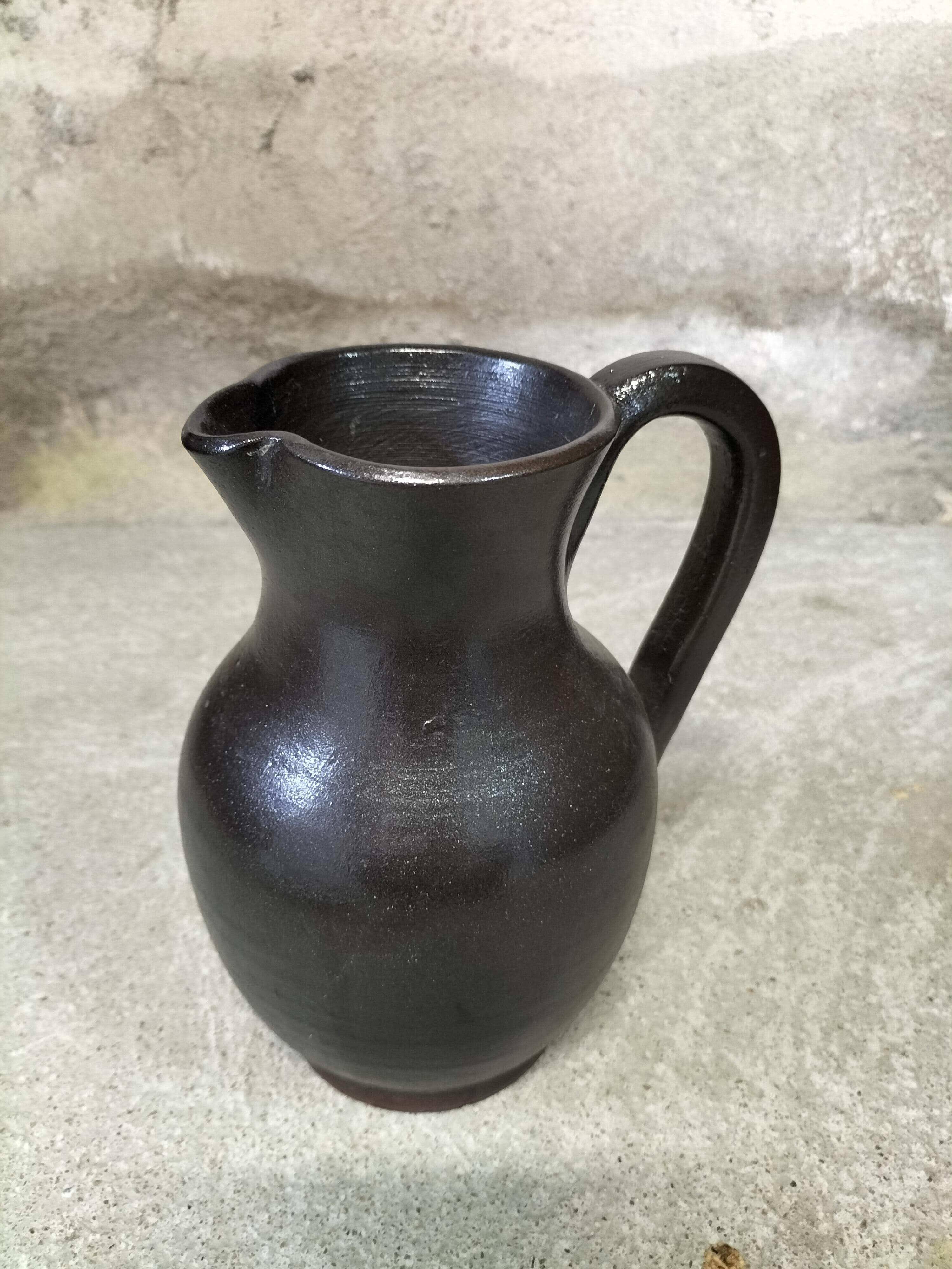 Ceramic pitcher signed Jean Dubost