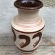 Antique beige ceramic vase with decorative painting
