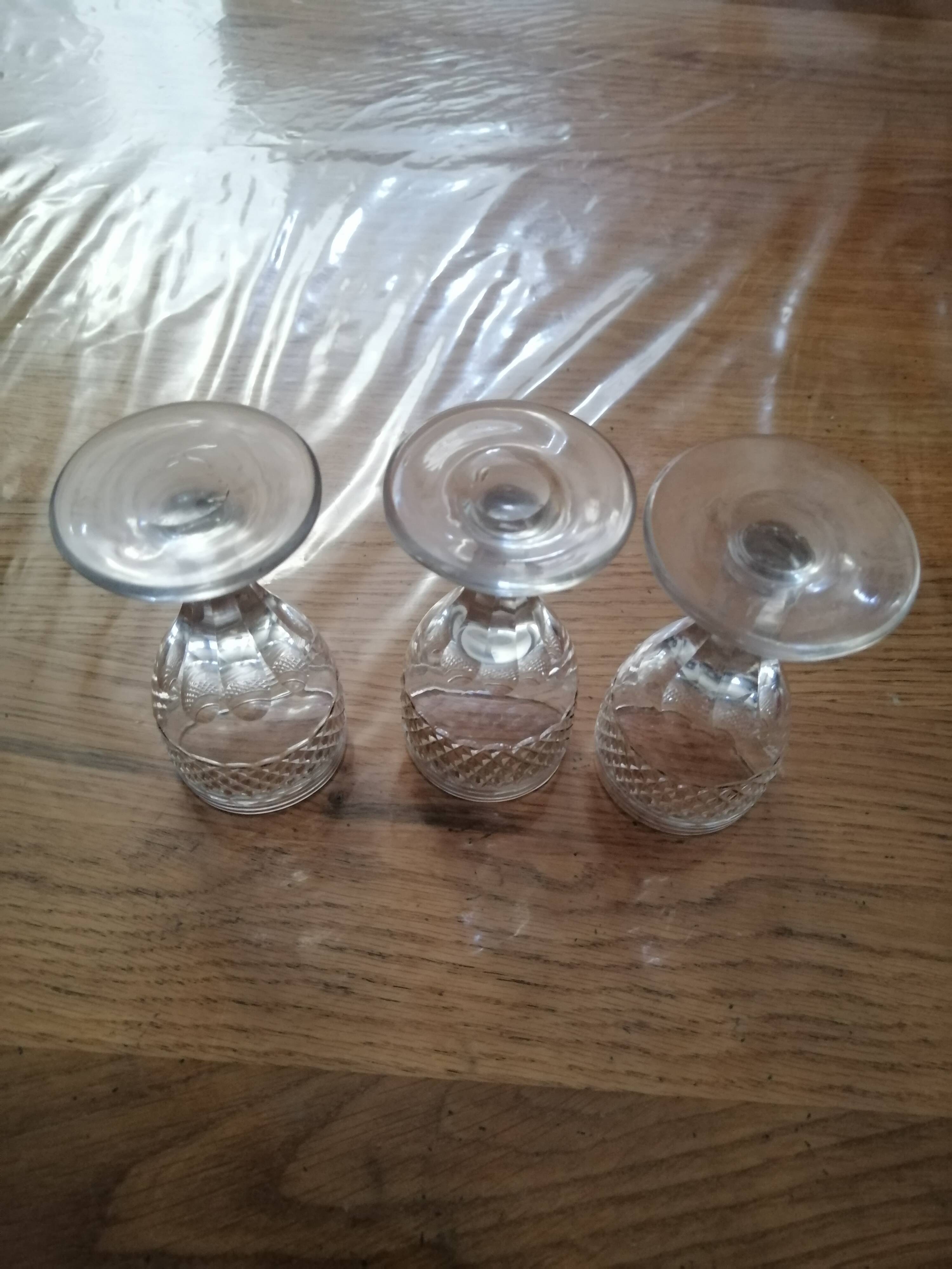 3 old vintage glass on feet