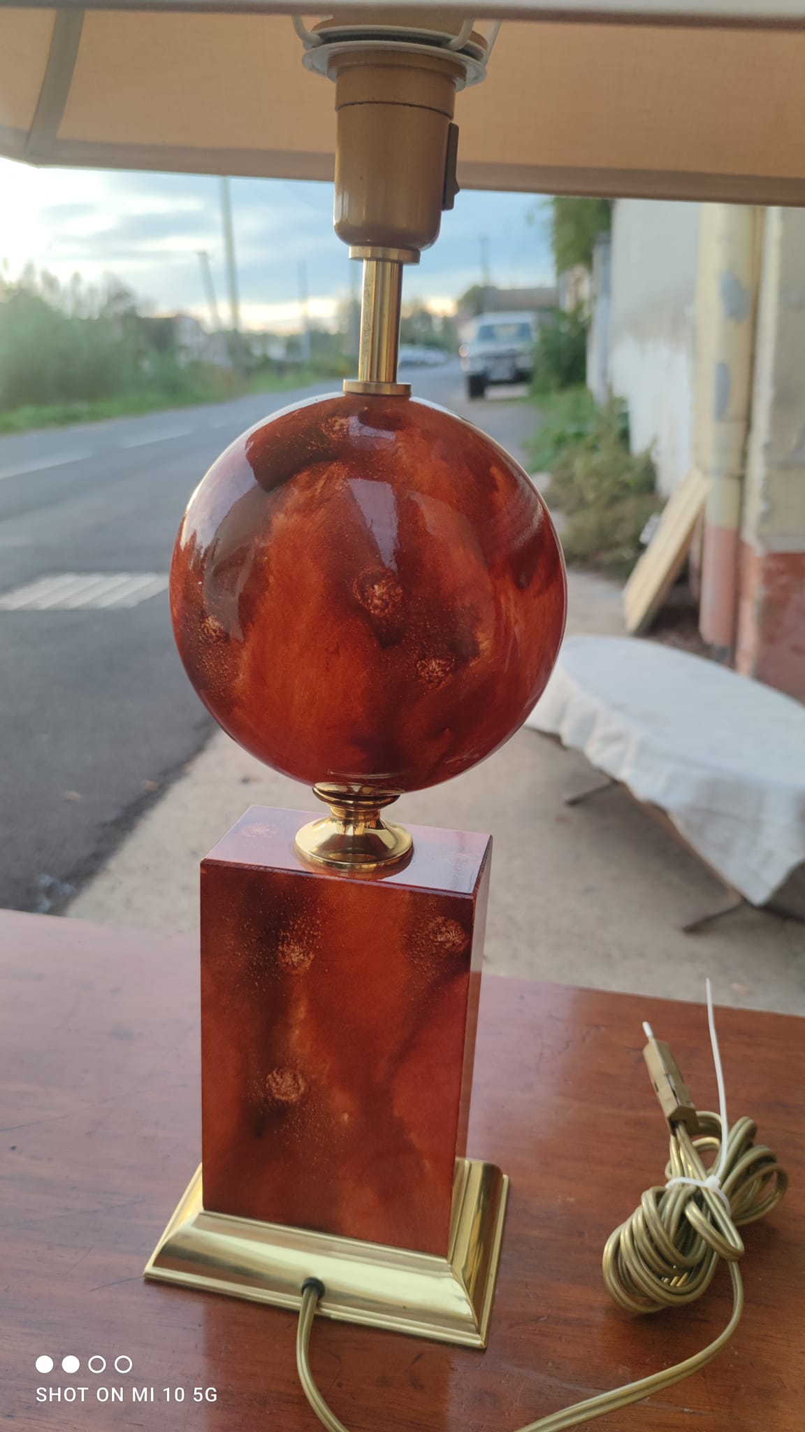 Lamp circa 1970 in iron and lacquered wood as well as bronze