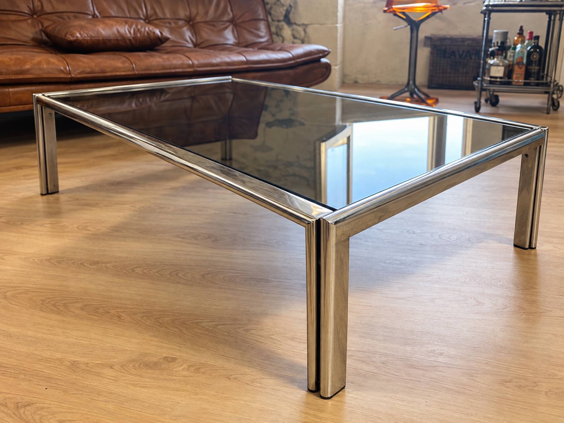 Vintage coffee table in chrome and smoked glass – 1970s/80s