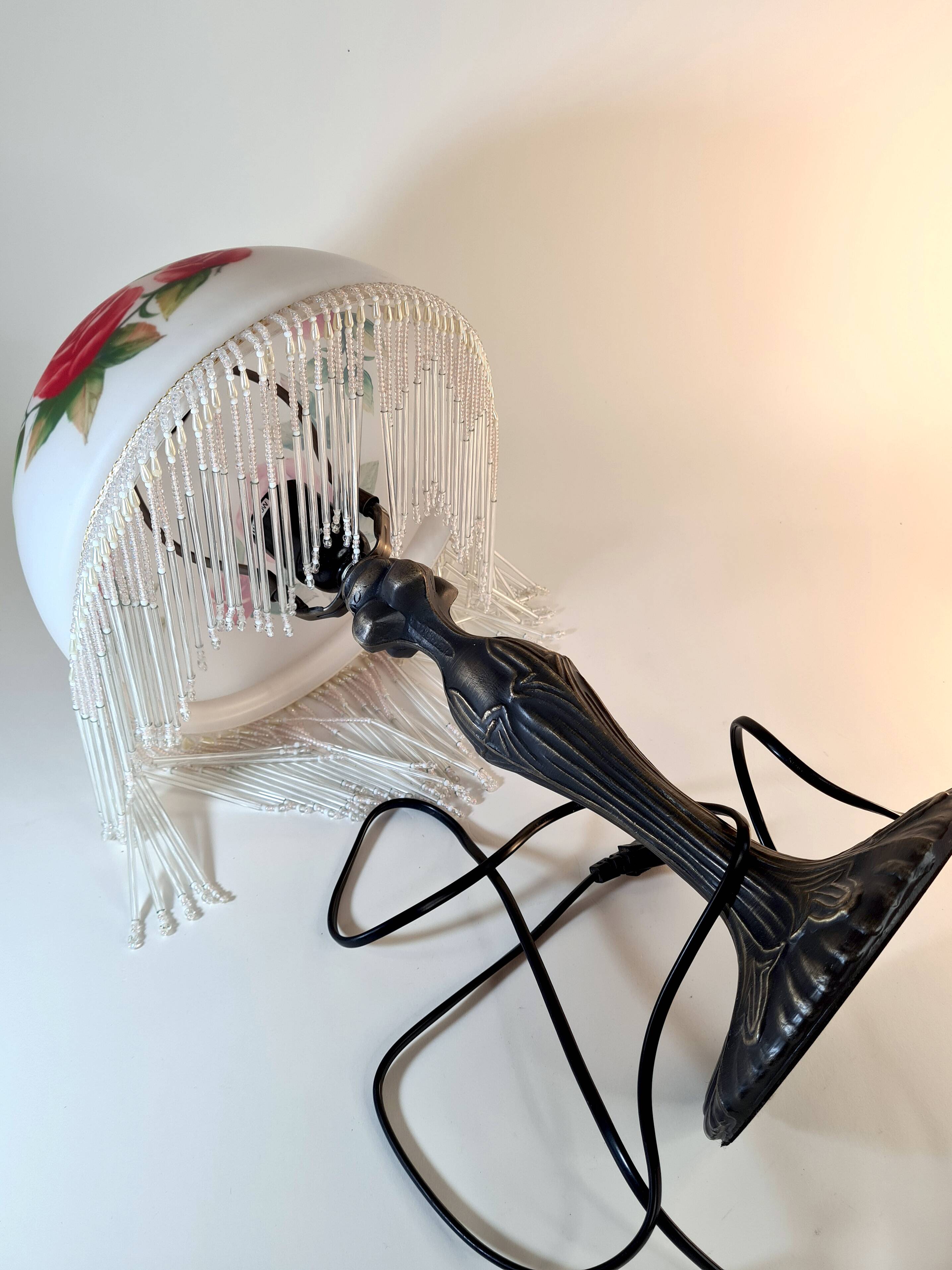 Vintage Tiffany-style fringed lamp with floral globe