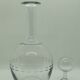 Engraved round decanter and its bubble top
