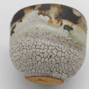 Trilogy of cups or Japanese-style goblets by the Danish ceramist Gutte Eriksen using RAKU technique.