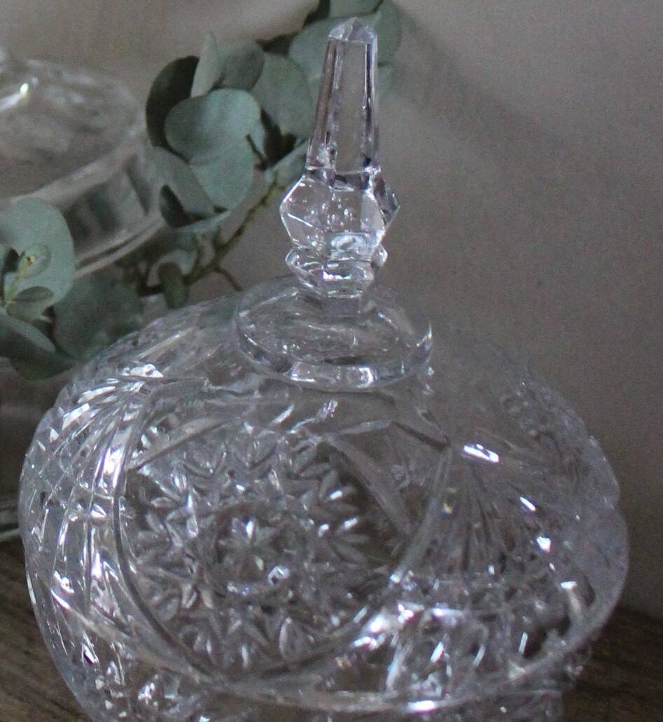 Cut glass sugar bowl on a stand