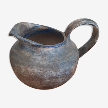 Pitcher in ancient sandstone