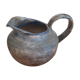 Pitcher in ancient sandstone