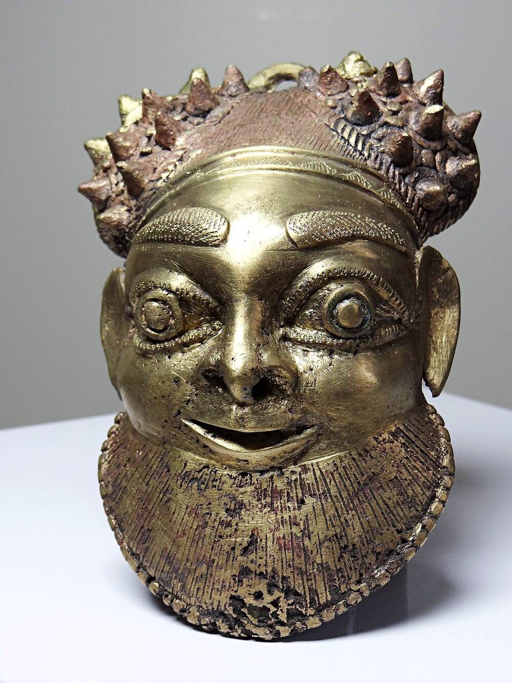 Small gilded bronze Oba mask from Bamoun, Cameroon, vintage Africa