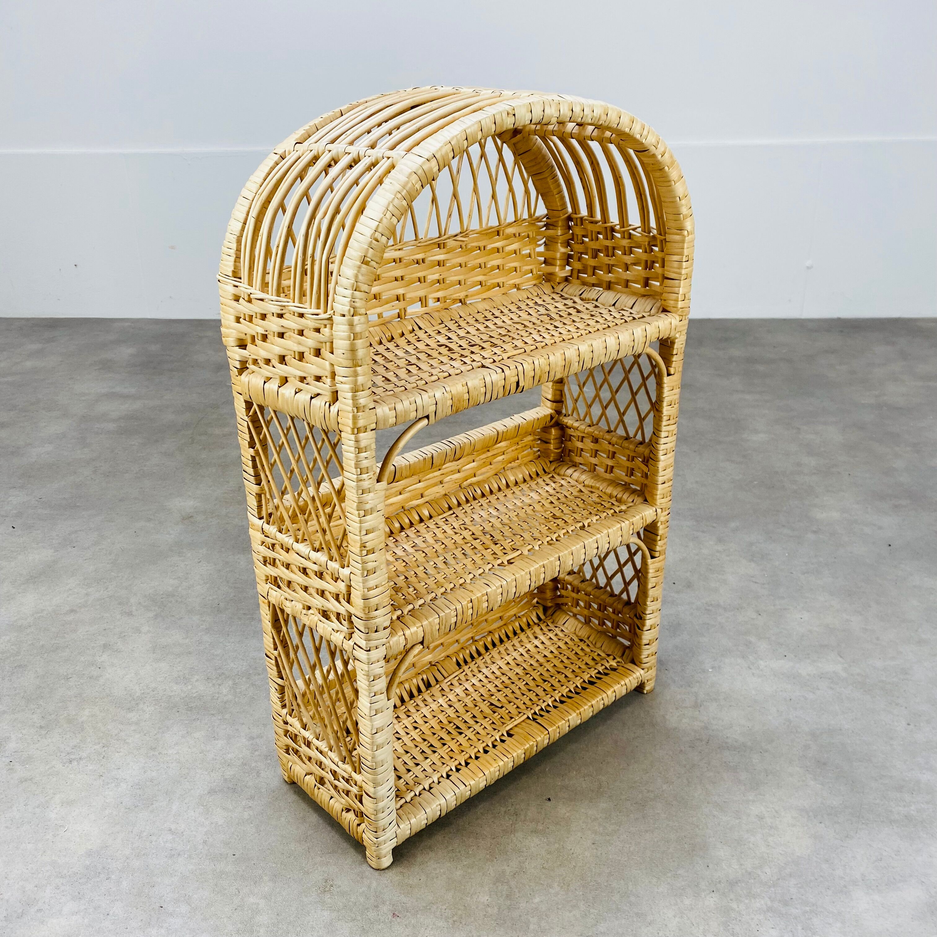 Rounded rattan shelf 60s