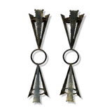 Pair of "brutalist" candlesticks in forged and hammered raw steel 70s