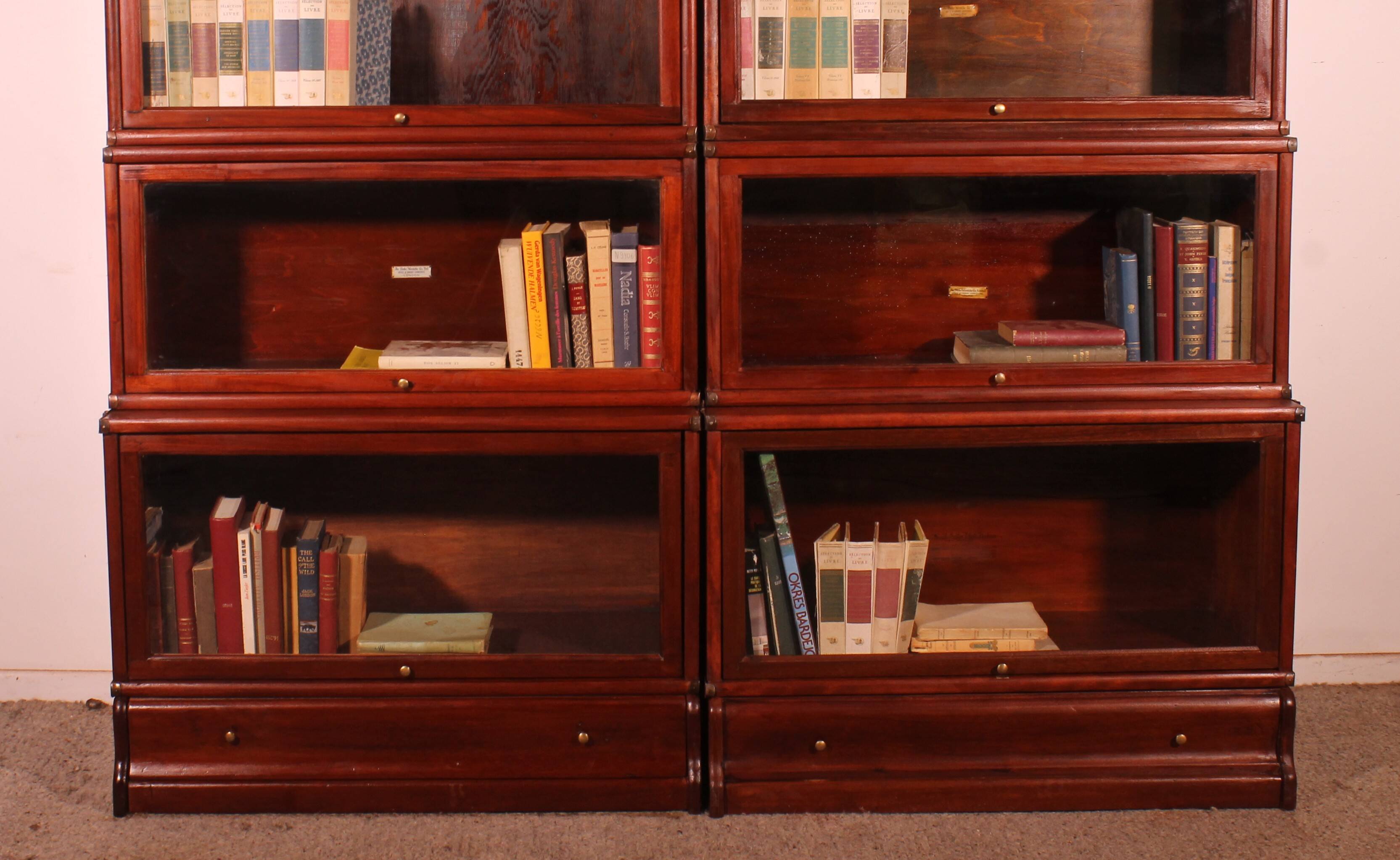 pair of Globe Wernicke London bookcases known as waterfall in mahogany circa