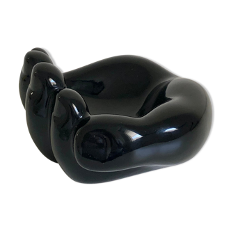 Empty black enamelled hand-shaped ceramic pocket, 1970