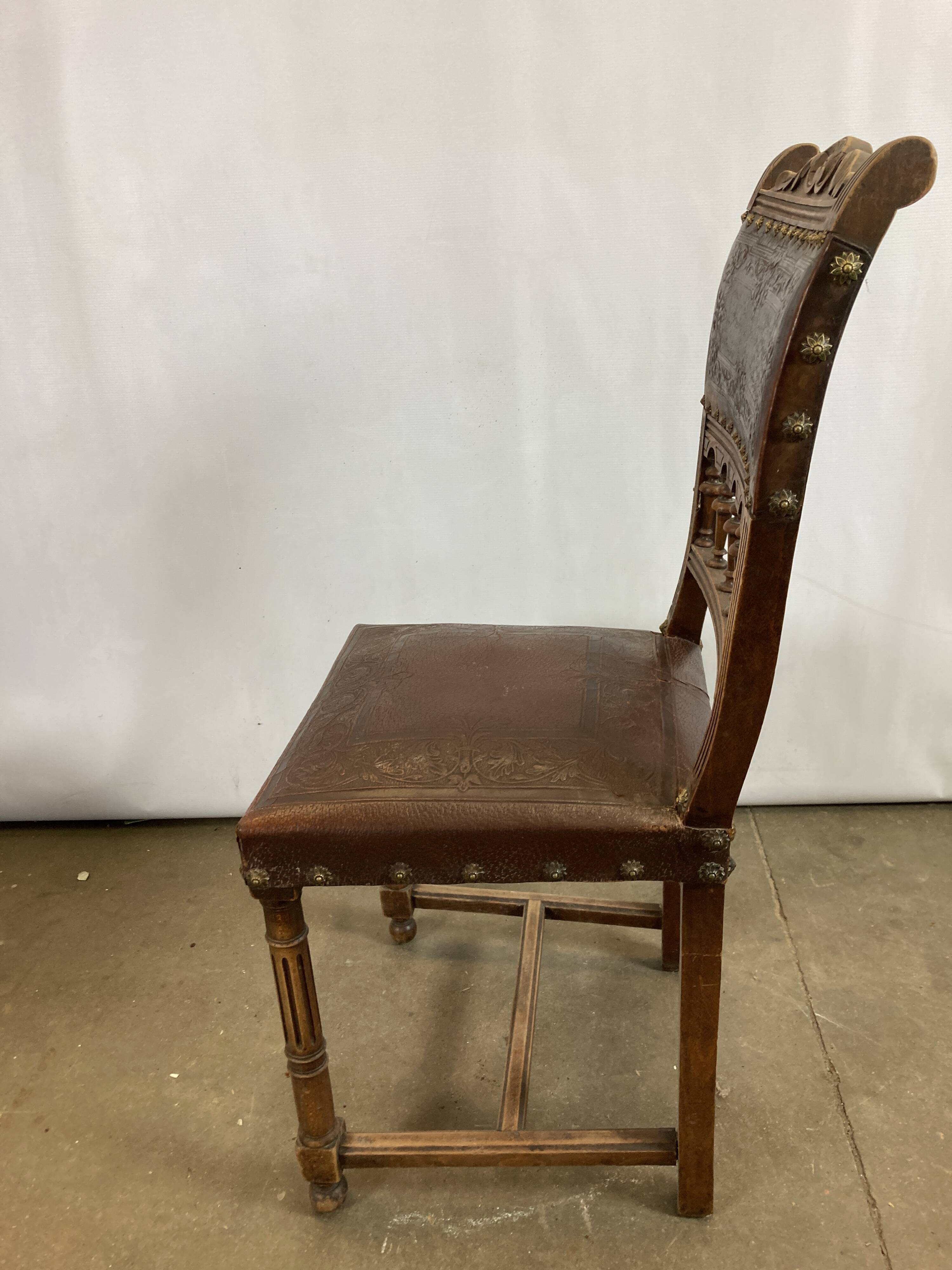 Pair of Henry II wooden and leather chairs