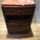 Solid oak bedside table with brown and white marble.