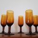 Set of 5 amber stemmed glasses