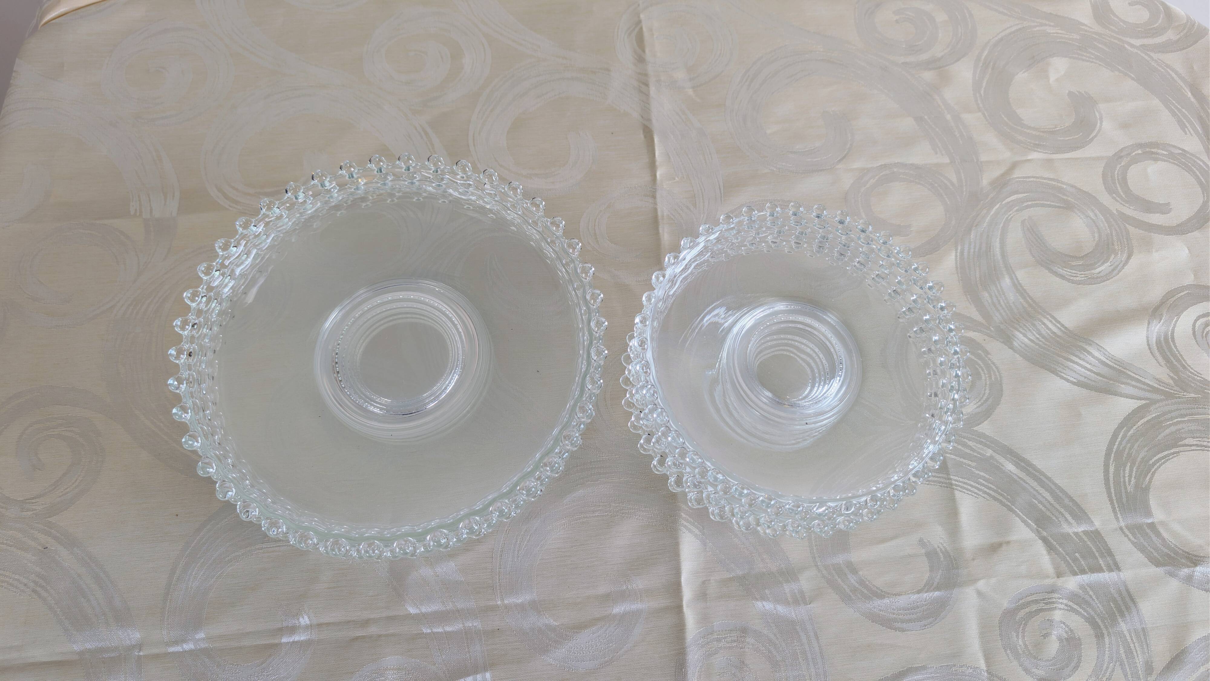 Vintage service of 12 pressed glass plates with bead decoration.