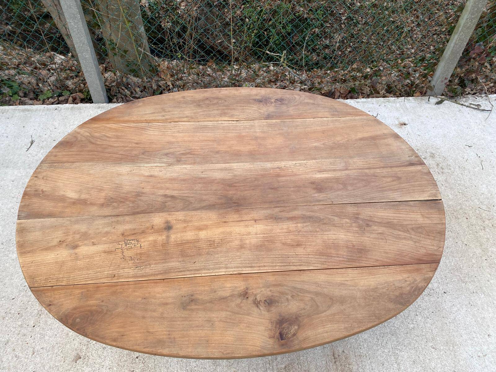 Louis Philippe oval table with shutters, 19th century, solid oak wood, twisted leg