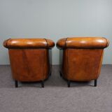 Set of 2 club chairs in black piping sheep leather
