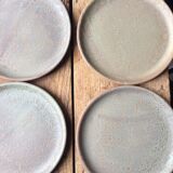 Set of 12 large and 11 small sandstone plates