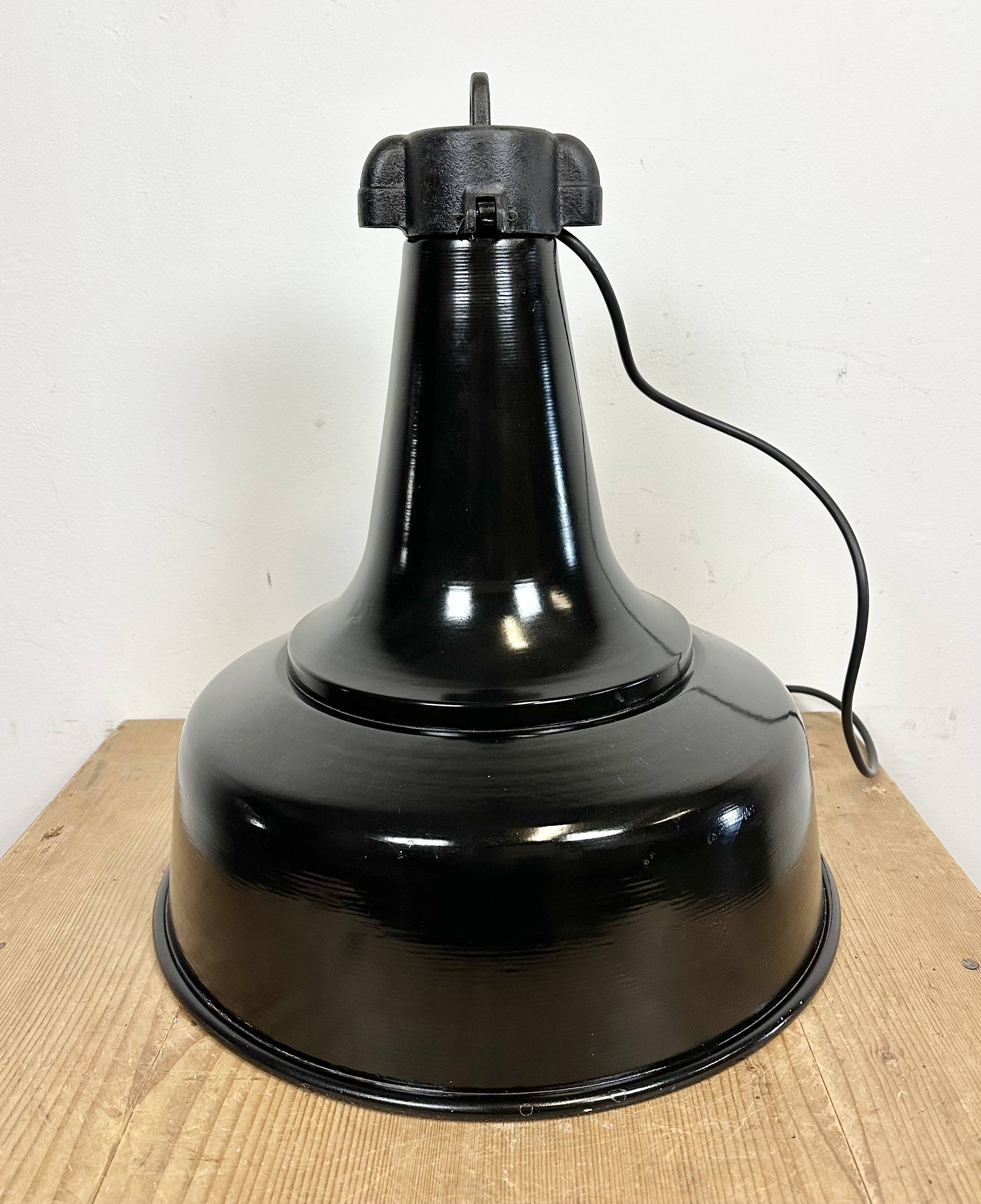 Industrial black pendant factory lamp with cast iron top, 1970s