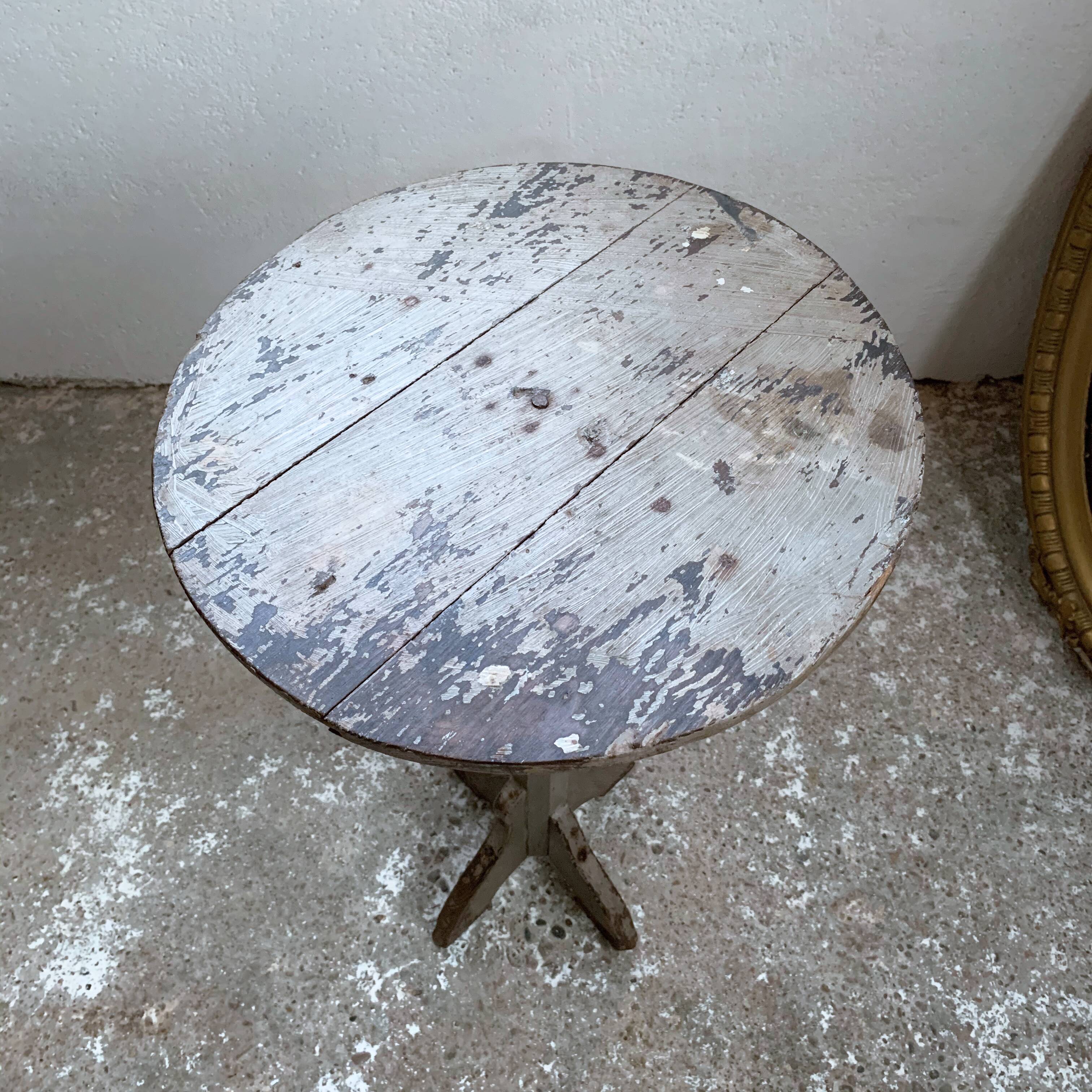 wooden pedestal or primitive winemaker's table