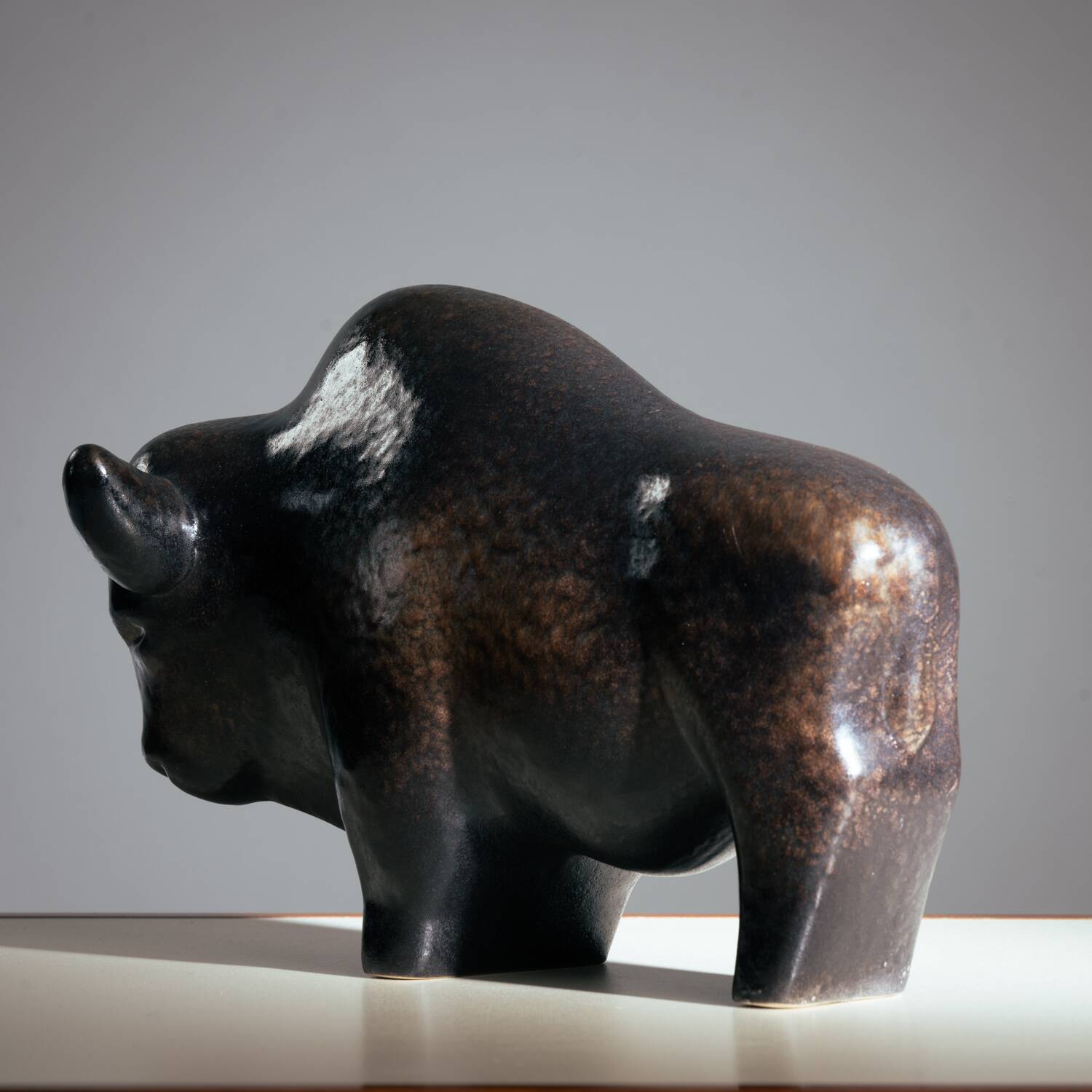 Brown glazed bull sculpture by Ed Ruscha, 1970s ceramic art