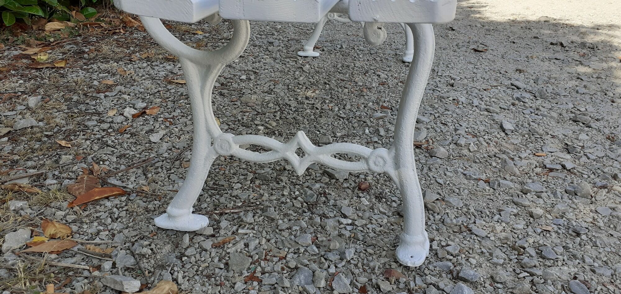 Old white garden bench cast iron feet 19th century