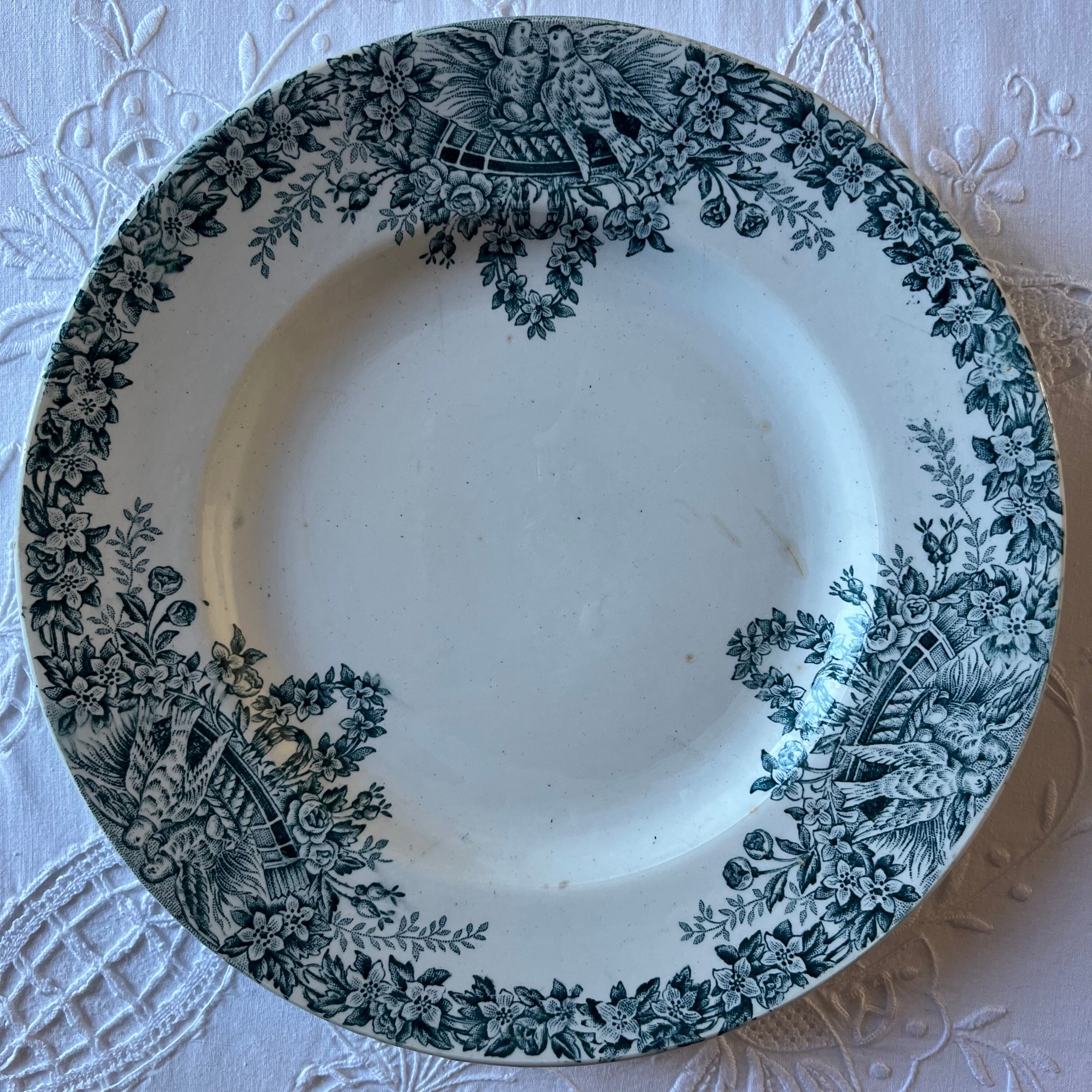 4 iron earth plates decorated with birds