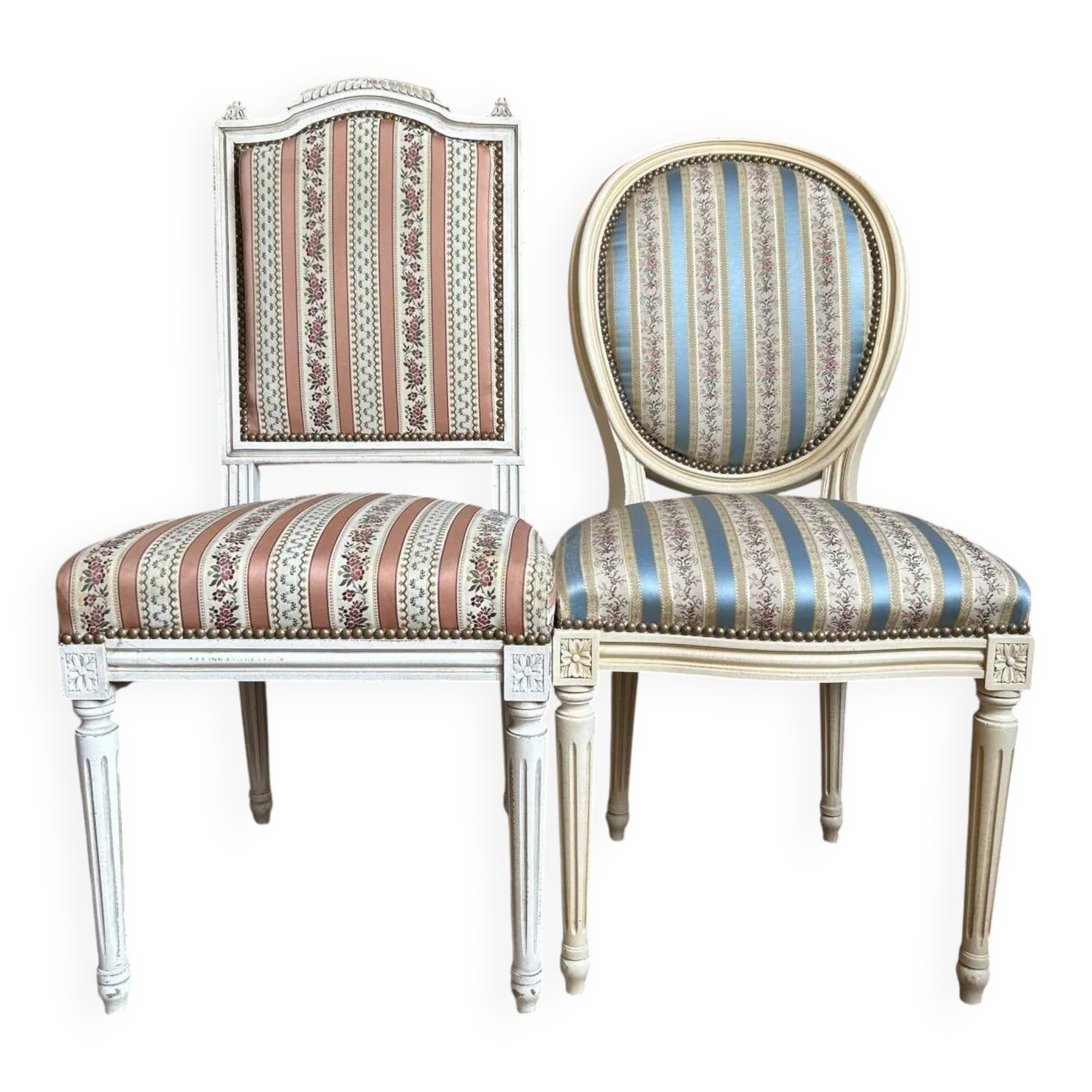Pair of Louis XVI style chairs in painted wood and satin, classic elegance.