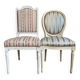 Pair of Louis XVI style chairs in painted wood and satin, classic elegance.