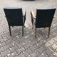 2 Dark green vintage wood and leather armchairs
