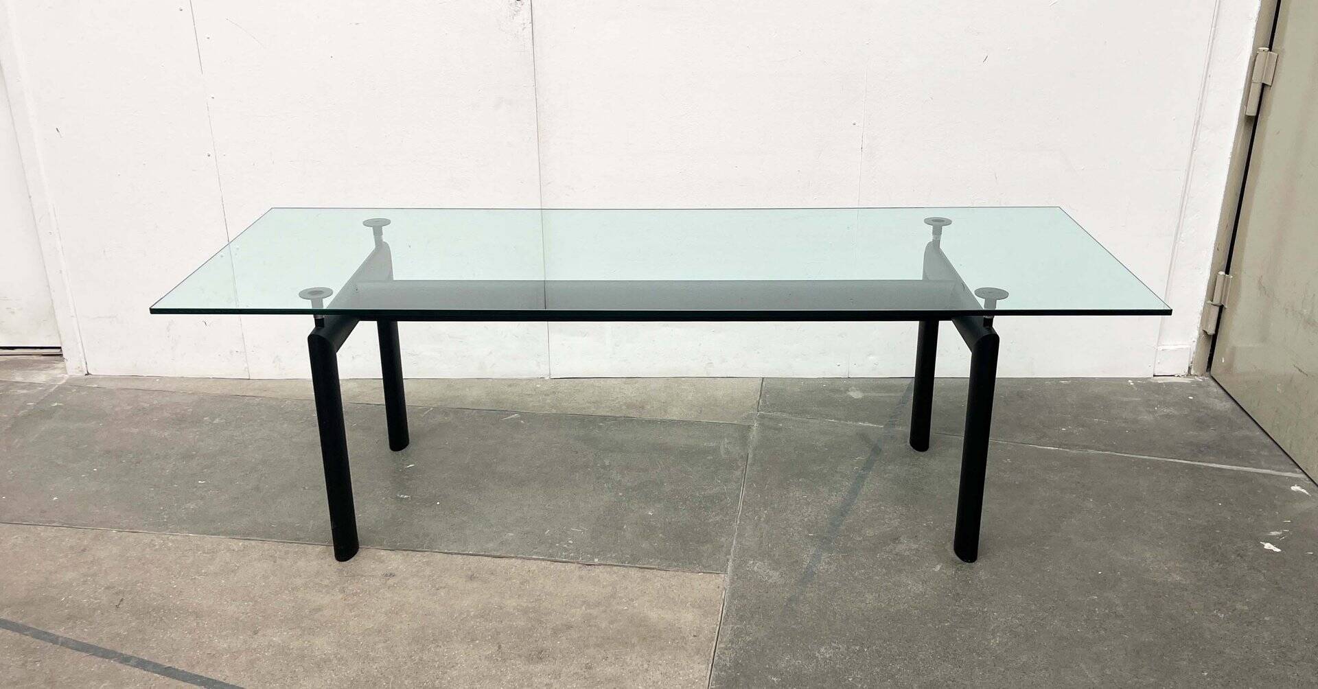 Italian model LC6 dining or office table in metal and glass by Le Corbusier, Pierre Jeanneret, Charlotte Perriand for Cassina.