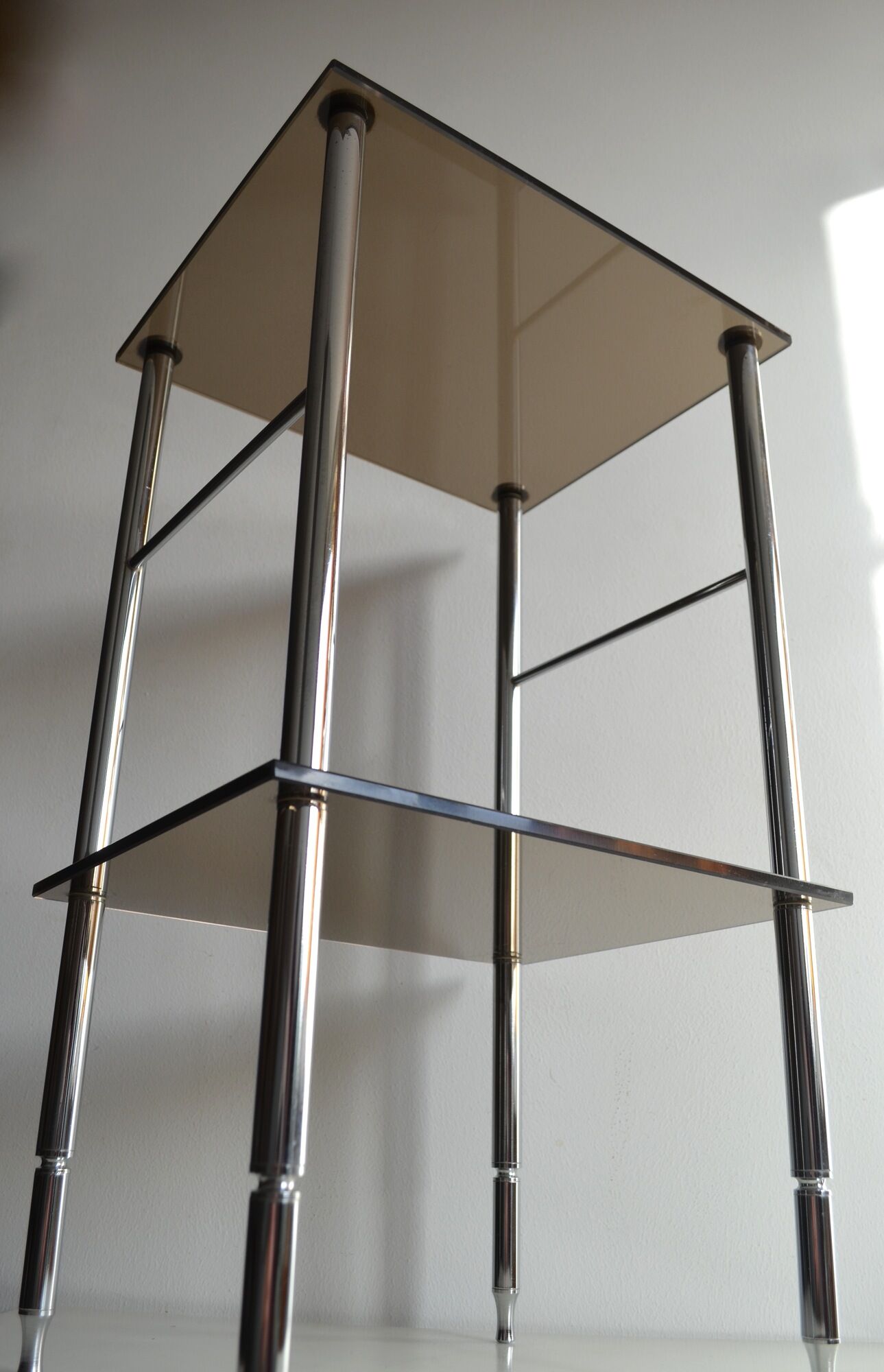 Side table in chrome and smoked glass