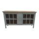 Vitrine vintage de faible profondeur sublimée en vert de gris plateau bois.