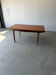 Table rectangulaire à rallonges design scandinave en teck massif