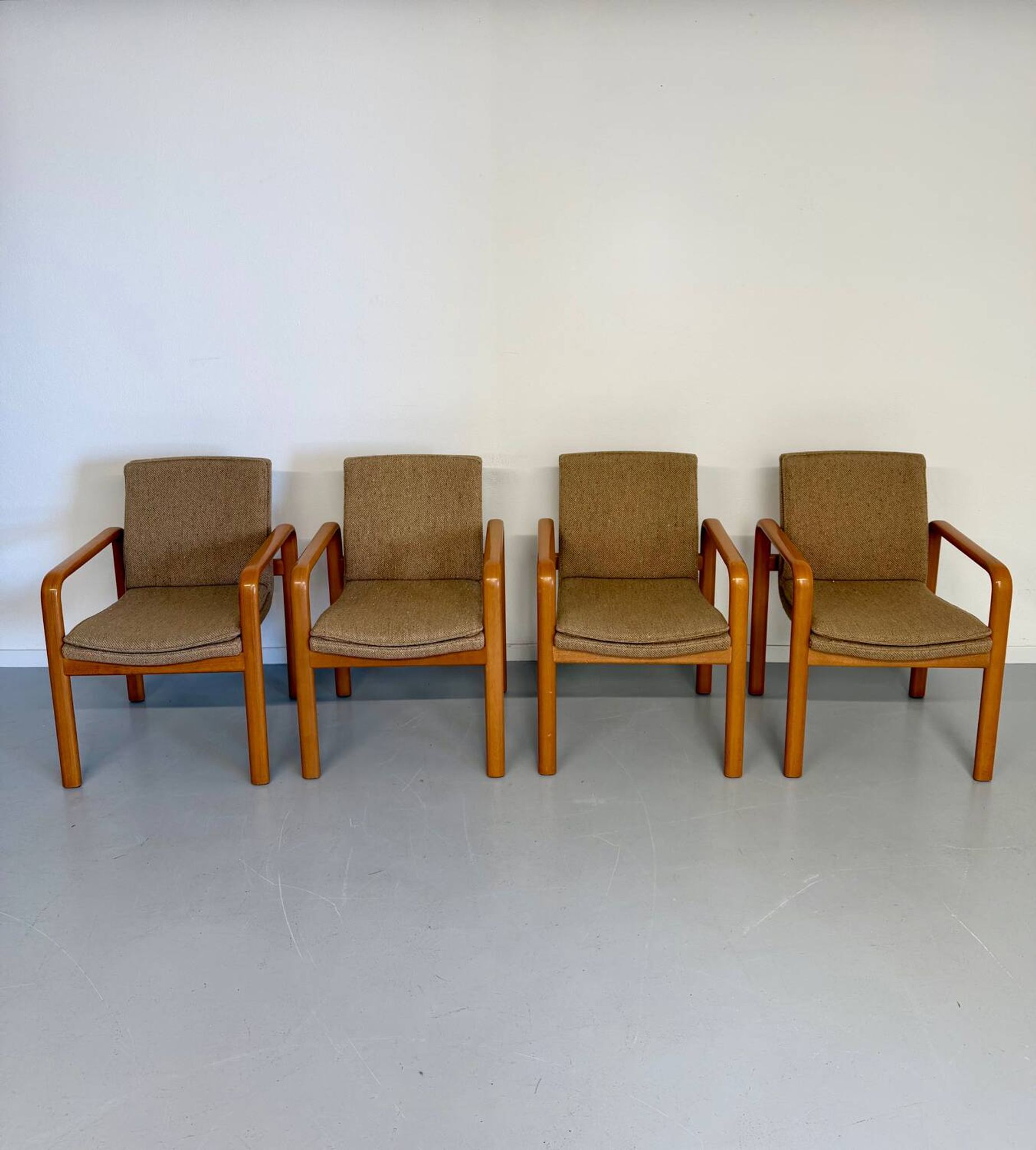 4 armchairs with armrests in beech and fabric, 1970s vintage design.