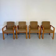 4 armchairs with armrests in beech and fabric, 1970s vintage design.
