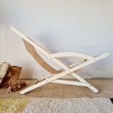 Old white wood deck chair Triconfort