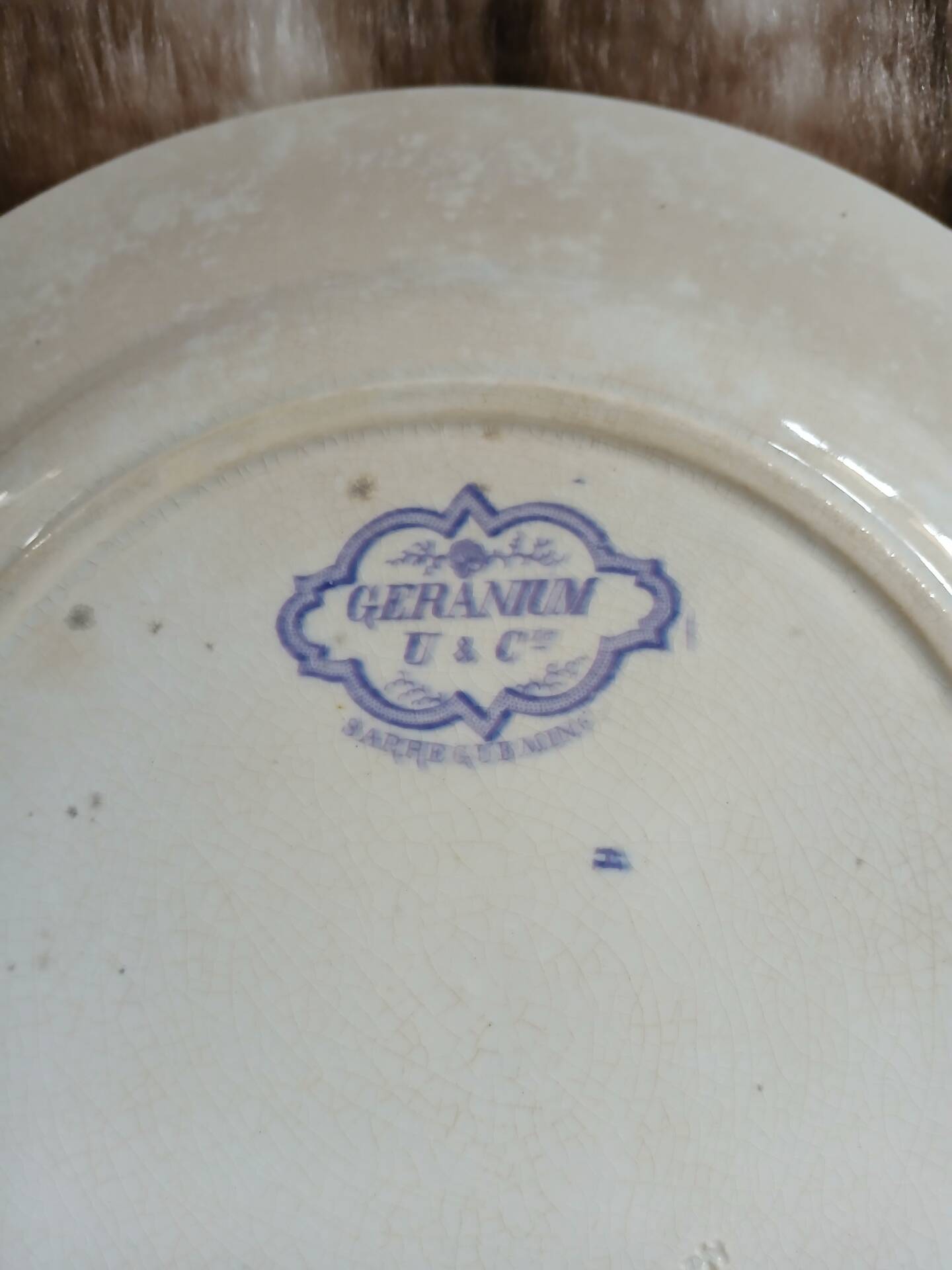 Plat ancien en terre de fer Sarreguemines 