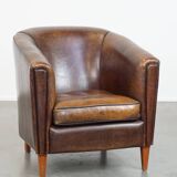 Sheep leather club chair finished with black piping
