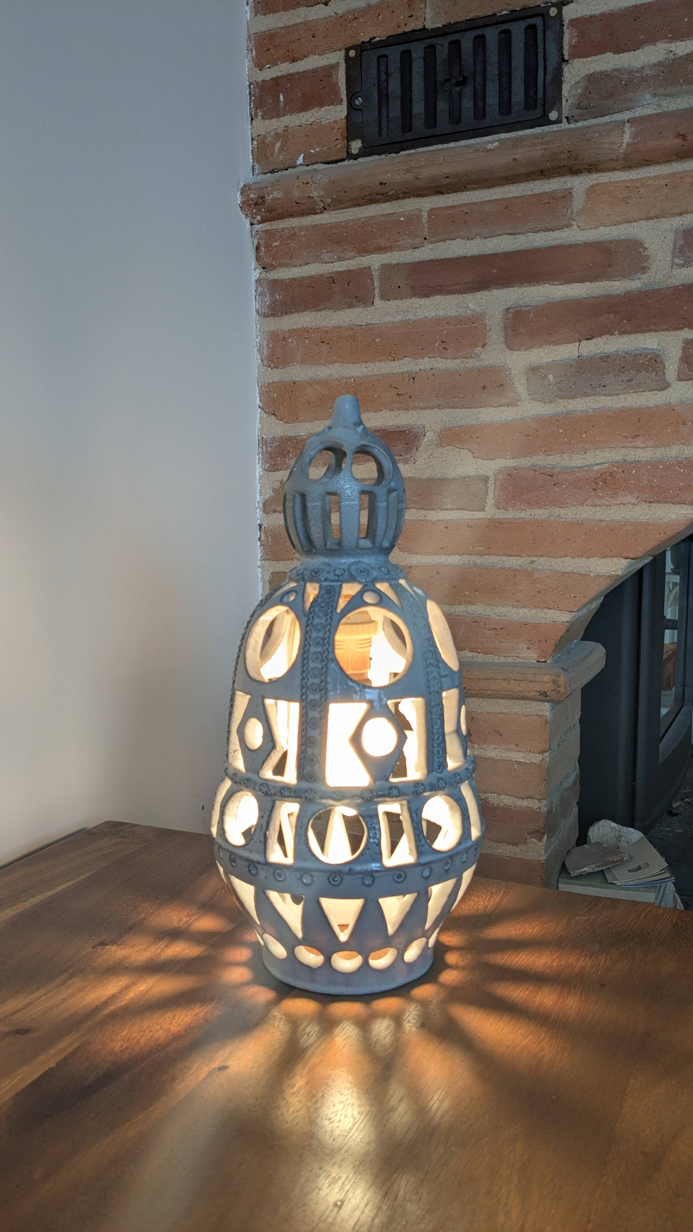 Ceramic lamp with cut-out design in the style of Roger Collet, 1960s.