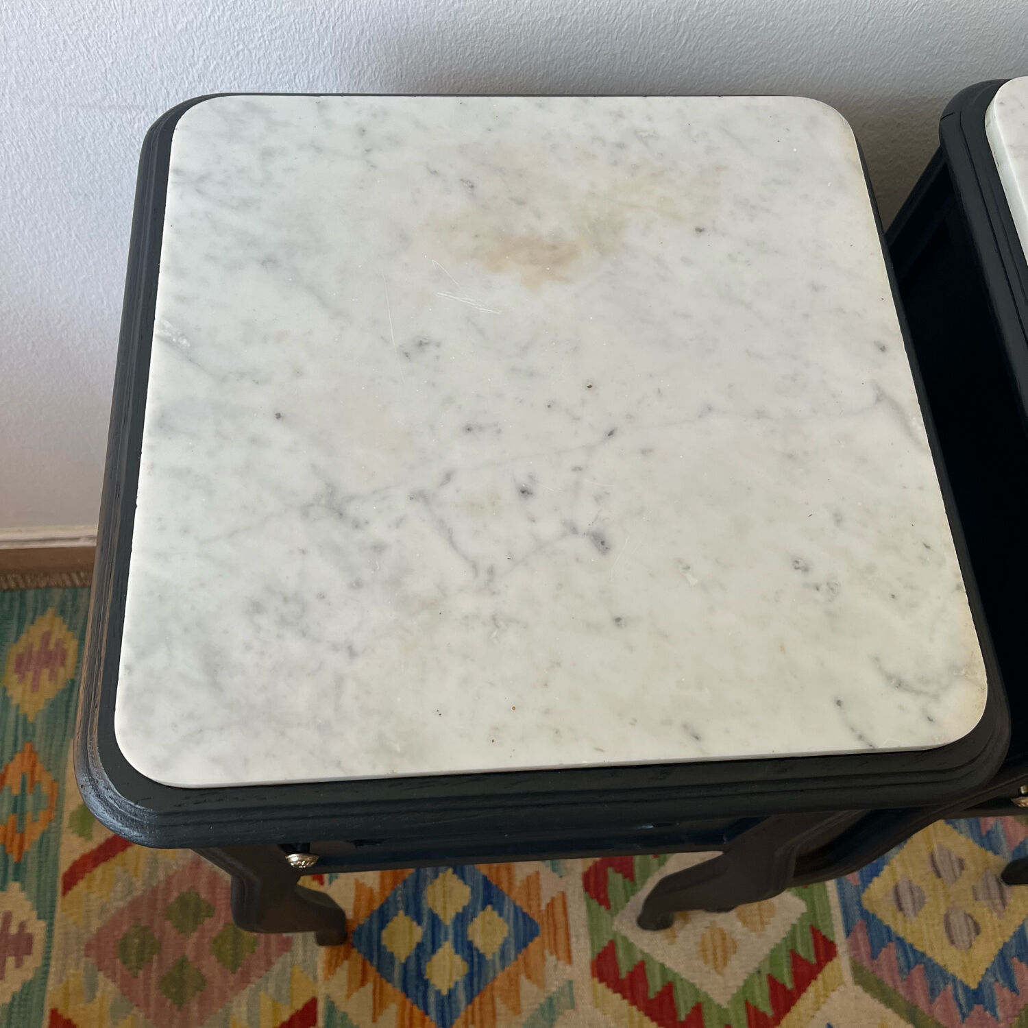 Pair of marble and wood bedside curved feet