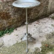 Side table pedestal table with silver cast iron plant