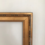 Cadre en bois doré sculpté 52x68,5 cm