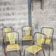 Six chaises en métal perforé seducta René Malaval