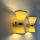 Pair of vintage wall lamps, solid brass and unbleached fabric, Italy 1980